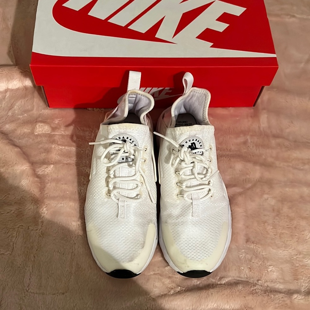 Nike Air Huarache white sneakers